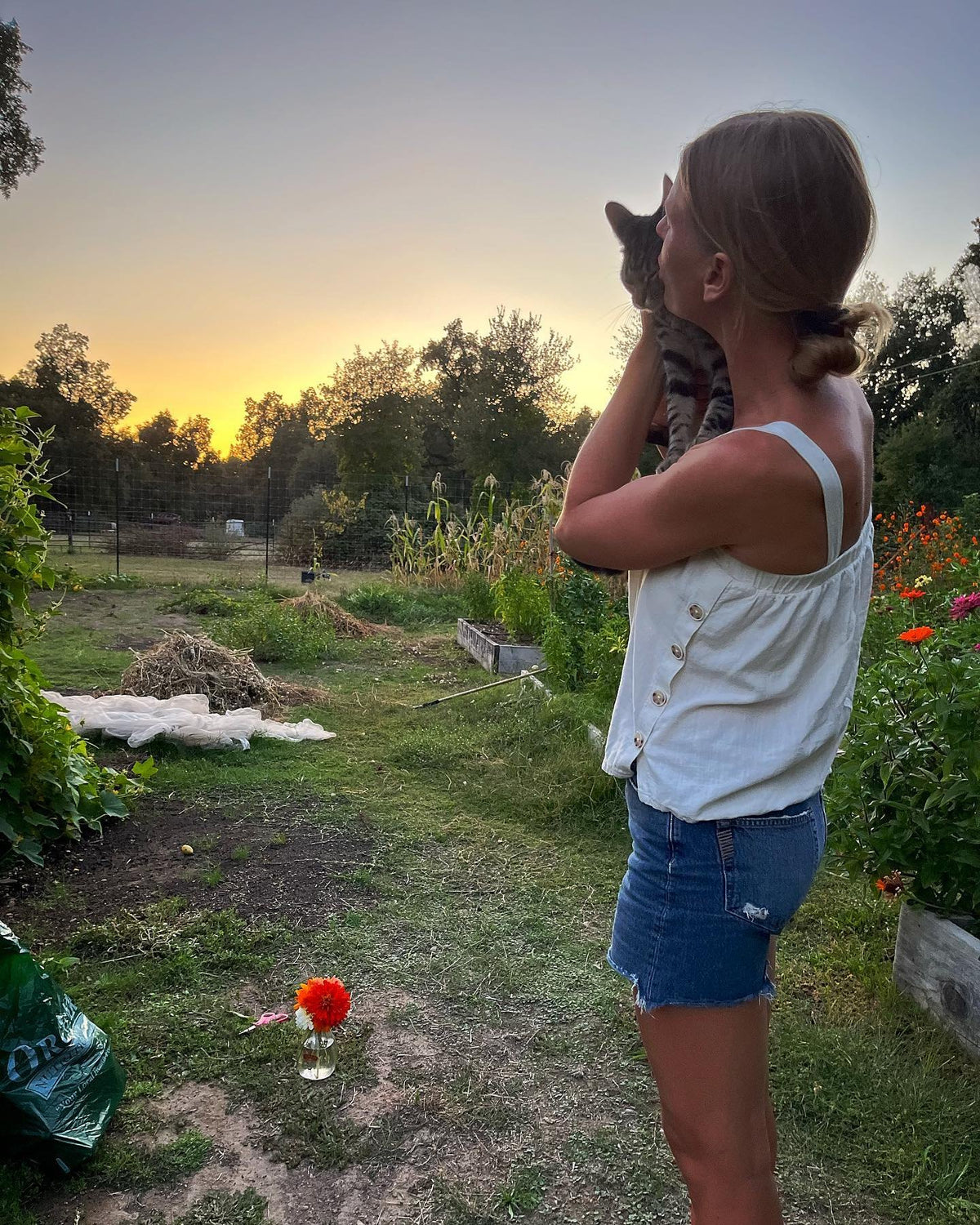 Hannah in the Fox Creek garden at sunset