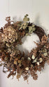 Dried hydrangea, fern, and eucalyptus wreath