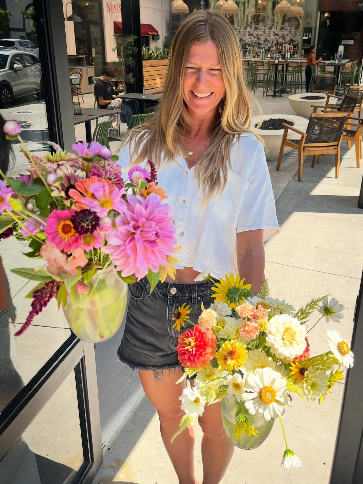 Hannah with two garden bouquets