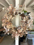 A large dried eucalyptus and fern wreath
