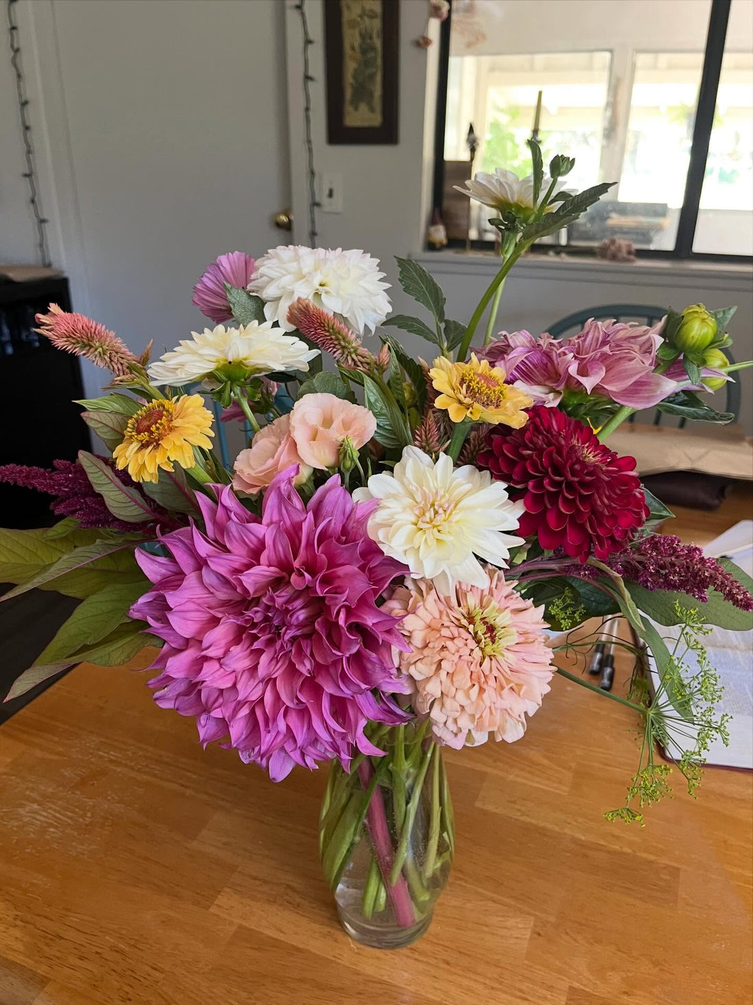 A July bouquet of dahlias, zinnias, celosia, and lisianthus